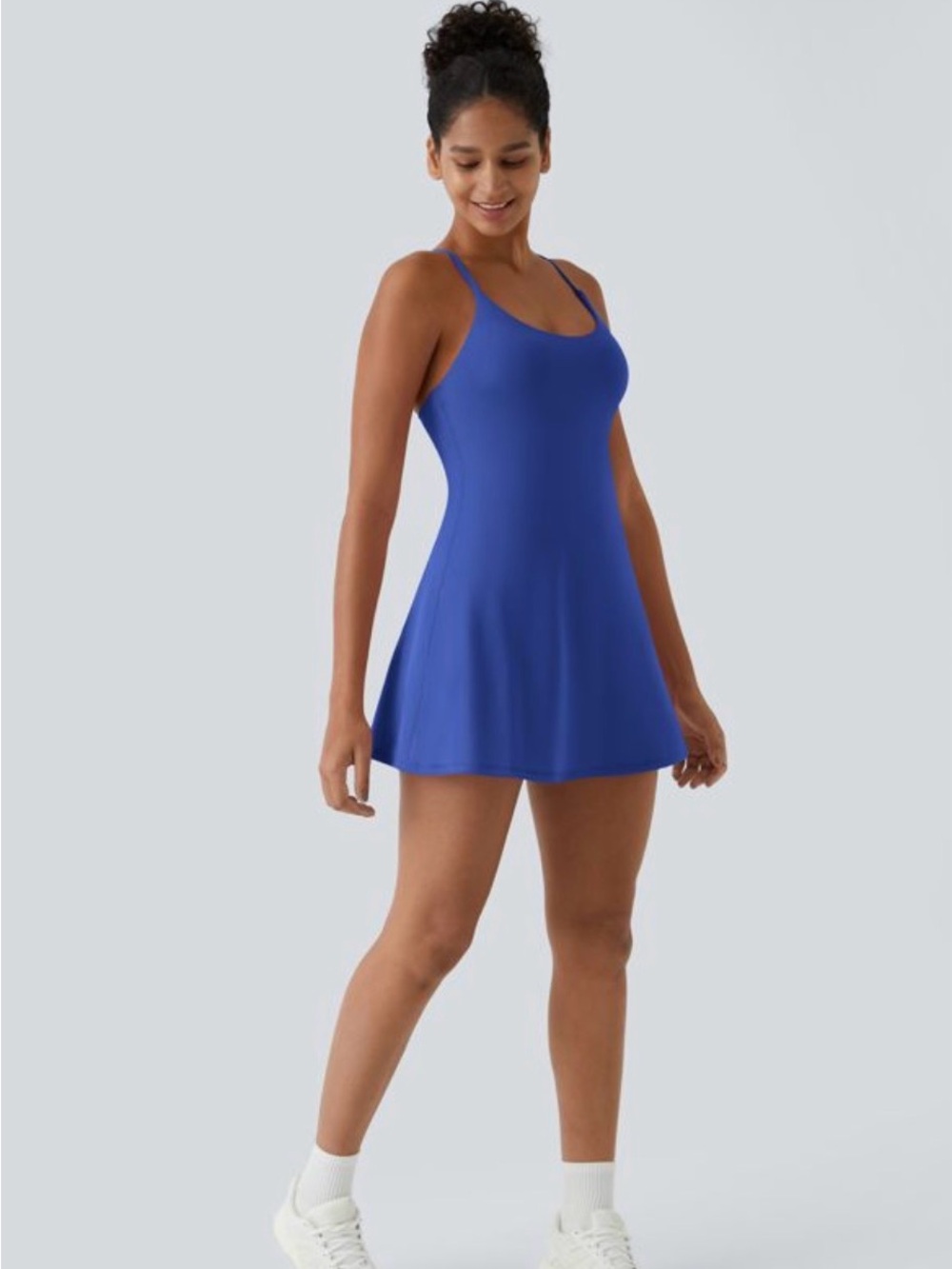 HALARA blue Athletic Dress with shorts and cross straps.